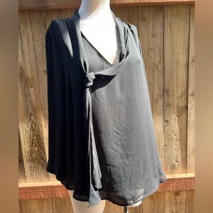 Beautiful flowing black blouse. Size 12.